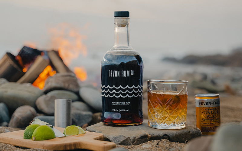 Devon Rum Company Devon Sunset Rum Cocktail with Black Spiced Rum on the Beach