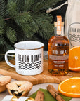Devon Rum Co Enamel Mug and Honey Spiced Rum with a festive setting.